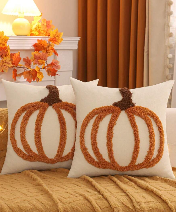 Pumpkin-themed throw pillows