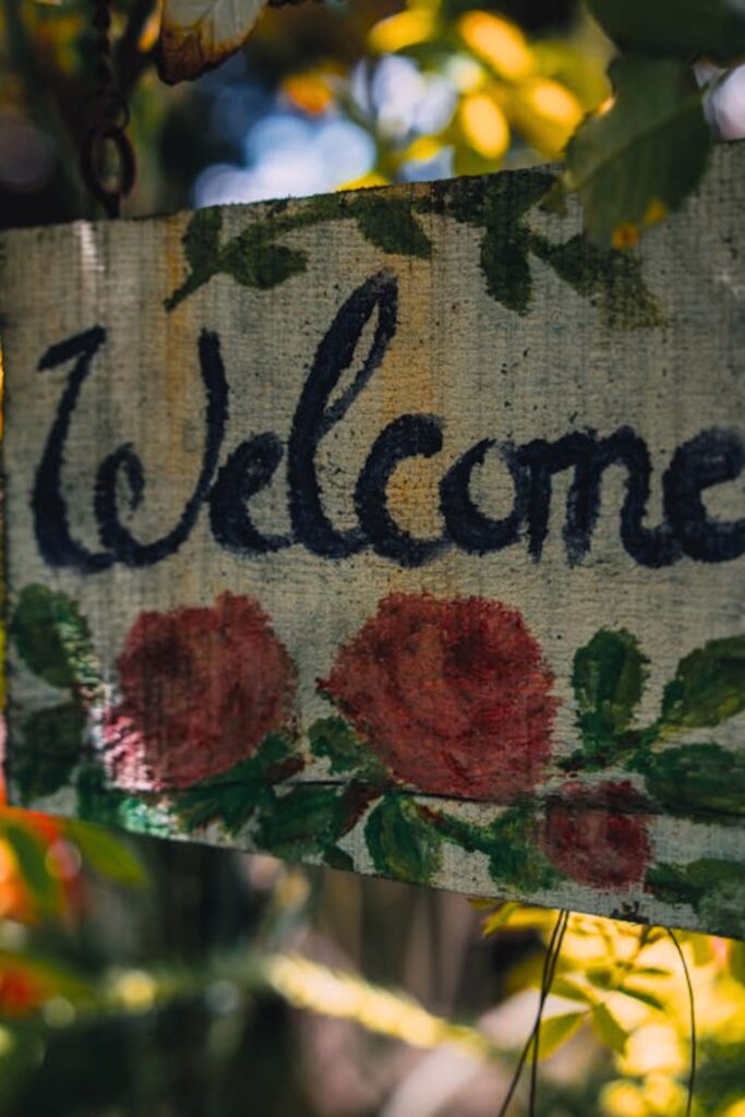 Wooden Welcome Plaque with Floral Accents